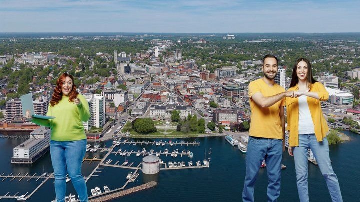 A red-haired woman pointing at her laptop and a young couple sharing a fist bump against a Kingston scene